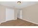 Bedroom with laminate flooring and closet offers ample storage at 14806 Del Morrow Way, Orlando, FL 32824