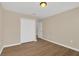 Neutral bedroom with closet and laminate flooring offers a blank canvas at 14806 Del Morrow Way, Orlando, FL 32824