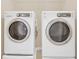 Laundry room with full-size washer and dryer for easy convenience at 14806 Del Morrow Way, Orlando, FL 32824