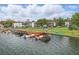 Aerial view of the community and lake docks at 151 N Orlando Ave # 229, Winter Park, FL 32789