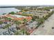 Aerial view of Trader Joe's with palm trees, parking and a glimpse of the nearby lake at 151 N Orlando Ave # 229, Winter Park, FL 32789