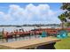 Community lake access with seating and boat dock at 151 N Orlando Ave # 229, Winter Park, FL 32789