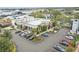 Commercial building with parking spaces and nice landscaping at 151 N Orlando Ave # 229, Winter Park, FL 32789