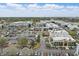 Aerial view of a large shopping center with a variety of retail stores, restaurants, and ample parking at 151 N Orlando Ave # 229, Winter Park, FL 32789