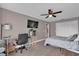 Bedroom featuring a ceiling fan, closet and tv at 1585 Randolph St, Deltona, FL 32725