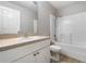 Cozy bathroom featuring a shower and tub combination and a vanity sink with storage at 1967 Villa Angelo Blvd, St Cloud, FL 34769