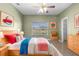 bedroom with fun decor, a window, and tile flooring at 2260 The Oaks Blvd, Kissimmee, FL 34746