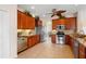 Spacious kitchen featuring stainless steel appliances and granite countertops at 2260 The Oaks Blvd, Kissimmee, FL 34746