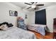 Bedroom with two beds, a ceiling fan, and storage for all your needs at 2478 Pillar Coral Dr # S, Orlando, FL 32808