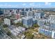 A high-rise condo with stunning city views featuring modern architecture and lush surroundings at 260 S Osceola Ave # 601, Orlando, FL 32801