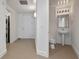 This is a half bathroom featuring a pedestal sink and tiled floors at 260 S Osceola Ave # 601, Orlando, FL 32801