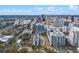 Panoramic city view of downtown skyscrapers, lush greenery, and a bustling highway network at 260 S Osceola Ave # 601, Orlando, FL 32801
