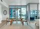 Well-lit dining room featuring modern furnishings and floor to ceiling windows at 260 S Osceola Ave # 601, Orlando, FL 32801