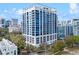 Modern high-rise condo building with expansive windows and balconies, offering stunning city views at 260 S Osceola Ave # 601, Orlando, FL 32801