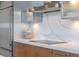 Close-up of modern kitchen with stainless steel appliances and beautiful countertop at 260 S Osceola Ave # 601, Orlando, FL 32801