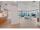 Bright, open-concept living space with floor-to-ceiling windows and modern finishes throughout at 260 S Osceola Ave # 601, Orlando, FL 32801