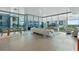 Bright living area boasts floor-to-ceiling windows, chic furniture, and a seamless flow for entertaining at 260 S Osceola Ave # 601, Orlando, FL 32801