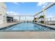 Rooftop pool with clear blue water offering a relaxing oasis with comfortable lounge seating and scenic sky views at 260 S Osceola Ave # 601, Orlando, FL 32801