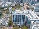 Beautiful condo building featuring a rooftop pool and lounge area with stunning views of the city at 260 S Osceola Ave # 601, Orlando, FL 32801