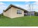 A beautiful yard features a screened-in lanai and mature landscaping at 2741 Southland St, St Cloud, FL 34772