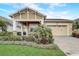 Charming single-story home with a well-manicured lawn and a welcoming front porch at 2741 Southland St, St Cloud, FL 34772