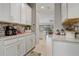 The kitchen has granite countertops, stainless steel appliances, and easy access to the dining and living areas at 2741 Southland St, St Cloud, FL 34772
