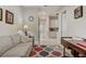 Comfortable living room view showcasing neutral decor, open floor plan, and lots of natural light at 2741 Southland St, St Cloud, FL 34772
