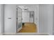 Bright bedroom featuring hardwood floors, a ceiling fan, and a Murphy bed with built-in storage at 2856 Broward Ct, Oviedo, FL 32765