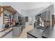 Well-equipped kitchen with modern appliances and pot rack at 2856 Broward Ct, Oviedo, FL 32765