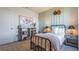 Inviting bedroom showcasing a comfortable bed, decorative accents, and a minimalist aesthetic at 3017 Moulin Rd, Davenport, FL 33837