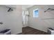 This walk-in closet features ample storage shelves, hanging rods, and a window for natural light at 3017 Moulin Rd, Davenport, FL 33837