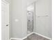 Modern bathroom featuring a glass-enclosed shower with stylish tile and updated fixtures at 411 Lily Ln, Davenport, FL 33837