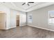 Bright bedroom with tray ceiling, and a large closet for ample storage at 411 Lily Ln, Davenport, FL 33837