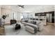 Living space showcasing a well-appointed kitchen, dining area, and comfortable seating at 411 Lily Ln, Davenport, FL 33837