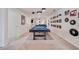 Finished basement with a pool table, great for entertaining, and unique decor at 4149 Lana Ave, Davenport, FL 33897