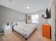 Comfortable bedroom boasts a queen-size bed, plush carpet, and neutral tones at 4149 Lana Ave, Davenport, FL 33897