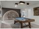 Entertaining game room features a pool table and a striking wall mural at 4149 Lana Ave, Davenport, FL 33897