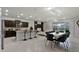 Open-concept layout features a modern kitchen, dining area, and living space, ideal for entertaining at 4149 Lana Ave, Davenport, FL 33897