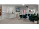Spacious living room featuring a modern design, comfortable seating, and a large television at 4149 Lana Ave, Davenport, FL 33897