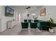 Beautifully staged living room boasts a sleek design with a contemporary sofa and chairs at 4149 Lana Ave, Davenport, FL 33897