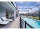 Enjoy swimming in this backyard pool with an attached spa in a screened in patio at 4149 Lana Ave, Davenport, FL 33897