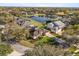 Overhead view of a well-maintained home with lush lawn and established landscaping at 4263 Lillian Hall Ln, Orlando, FL 32812