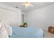 Spacious bedroom featuring a double door closet and carpet flooring at 4263 Lillian Hall Ln, Orlando, FL 32812