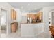 Bright kitchen with granite counters, stainless steel appliances, light wood cabinets, and tiled floors at 4263 Lillian Hall Ln, Orlando, FL 32812