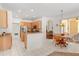 Bright kitchen with granite countertops and a dining area at 4263 Lillian Hall Ln, Orlando, FL 32812