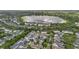 Picturesque aerial view of a residential community next to a lake and lush green landscape at 4533 Burke St, Orlando, FL 32814