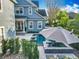 A bird's eye view showcases a luxurious pool and spa, highlighting the serene backyard and patio space at 4533 Burke St, Orlando, FL 32814