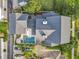 Breathtaking aerial view of the home, highlighting the private pool, patio, and meticulous landscaping at 4533 Burke St, Orlando, FL 32814