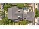 An aerial view of a beautiful house featuring a private pool, manicured yard and lush landscaping at 4533 Burke St, Orlando, FL 32814
