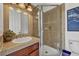 Bathroom featuring glass shower with tiled walls at 4533 Burke St, Orlando, FL 32814